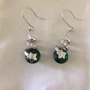 Pierced silver tone starburst earrings